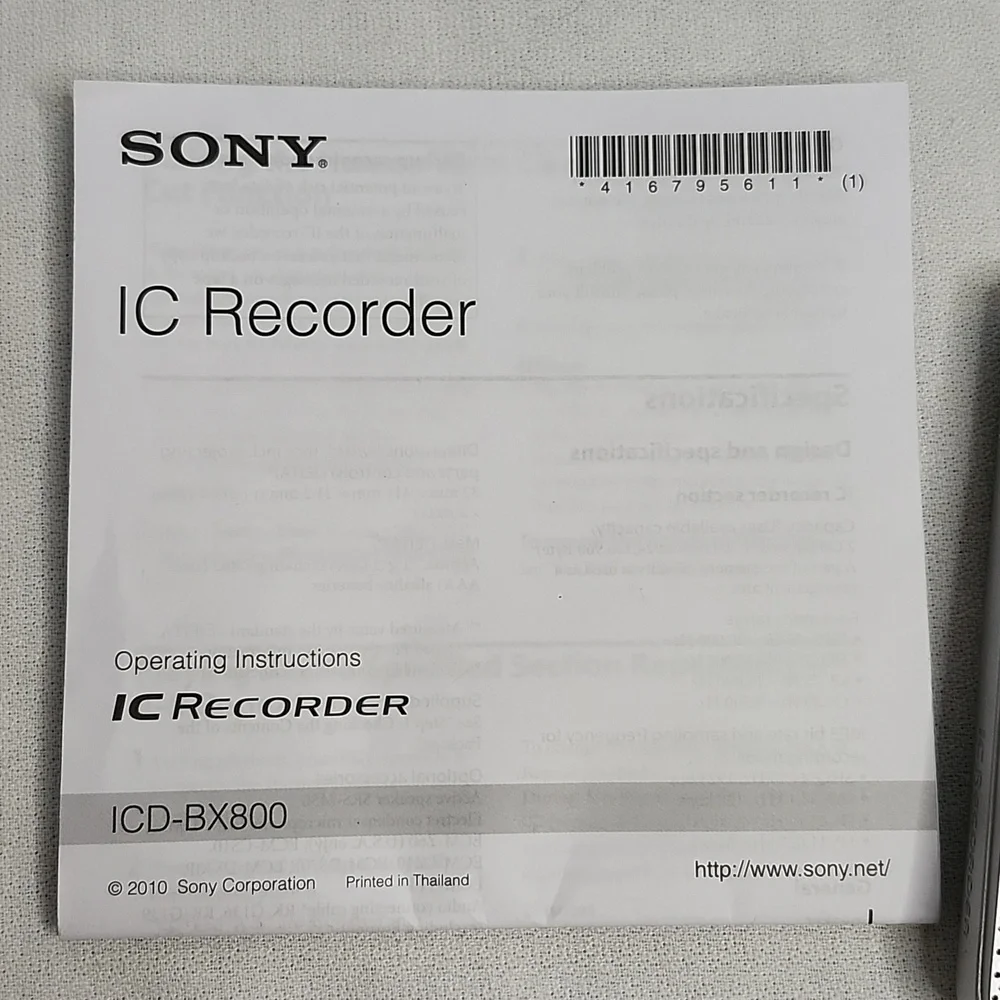 Sony ICD-BX800 Recorder, headphones and Sharp EL-W516 Calculator